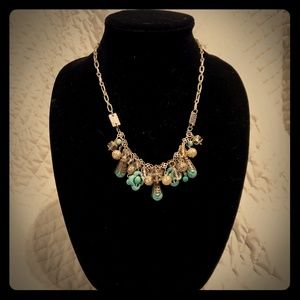 Turquoise, crystal, and silver necklace.